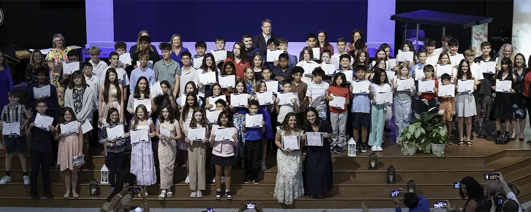 Plato Academy Academic Excellence Awards 2026 ceremony, showing award recipients and principals from eight campus locations celebrating advanced student achievement in rigorous curriculum including mathematics, language arts, social studies, science, and Greek language studies